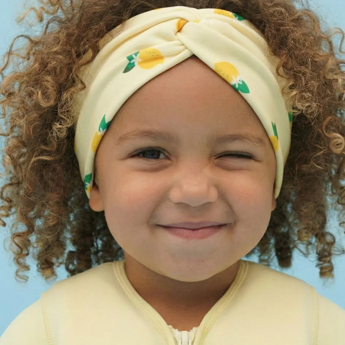 Cinta para la cabeza anti-UV para niña Plouf